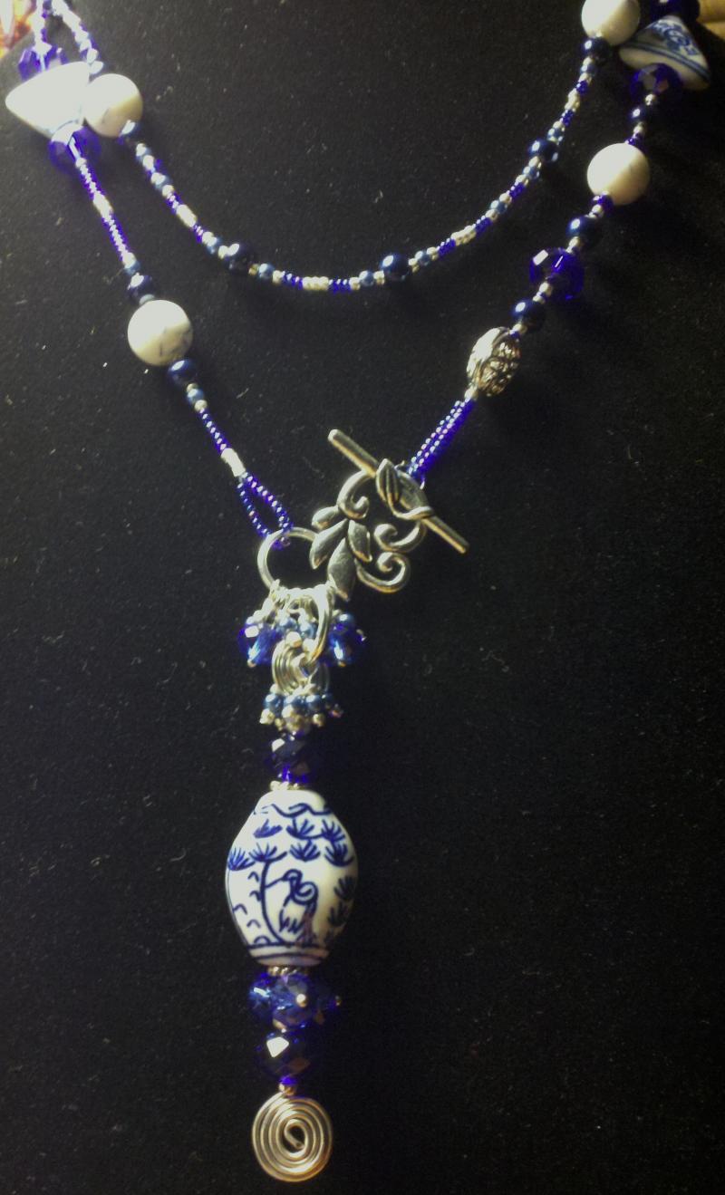 Blue & white ceramic, silver and blue glass bead necklace